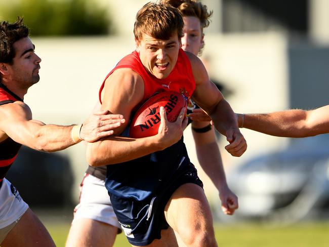 Harry Hynes of Old Brighton is tackled during the round nine 2023 Victorian Amateur Football Association William Buck Premier MenÃs match between Old Brighton and Old Xaverians at Brighton Beach Oval in Brighton, Victoria on June 17, 2023. (Photo by Josh Chadwick)