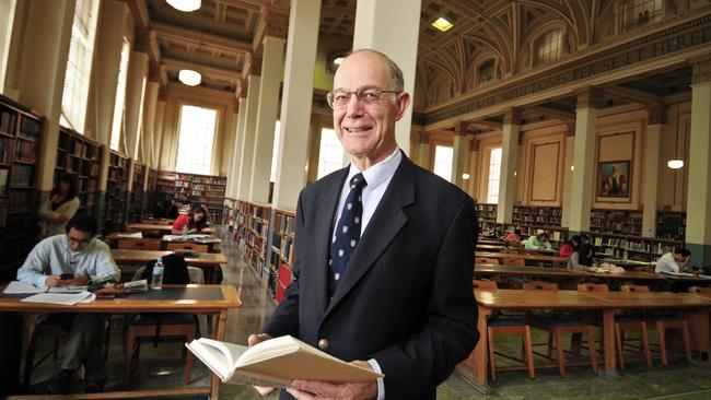 A 2009 photo of librarian Ray Choate in the reading room at Barr Smith Library.