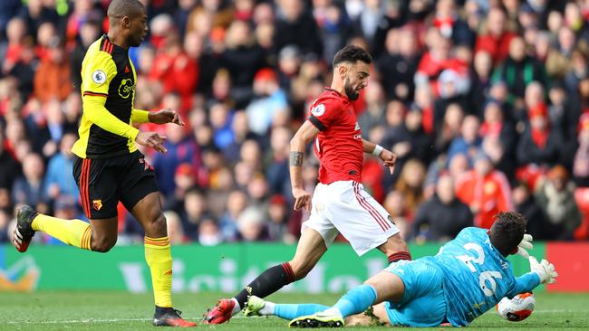 Manchester United midfielder Bruno Fernandes is fouled by Watford goalkeeper Ben Foster, resulting in a penalty for Utd at Old Trafford. Picture: Getty Images