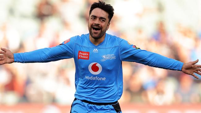 ADELAIDE, AUSTRALIA - JANUARY 11: Rashid Khan of the Strikers celebrates after taking a wicket during the Big Bash League match between the Adelaide Strikers and the Melbourne Stars at Adelaide Oval, on January 11, 2021, in Adelaide, Australia. (Photo by Daniel Kalisz/Getty Images)