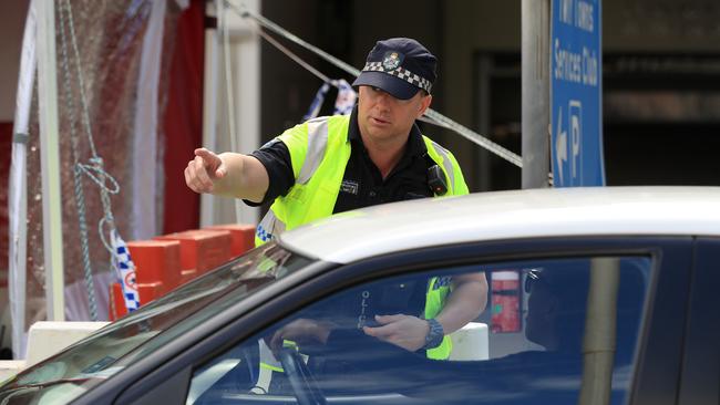 Police patrolling the Qld-NSW border at Coolangatta. Picture: Adam Head