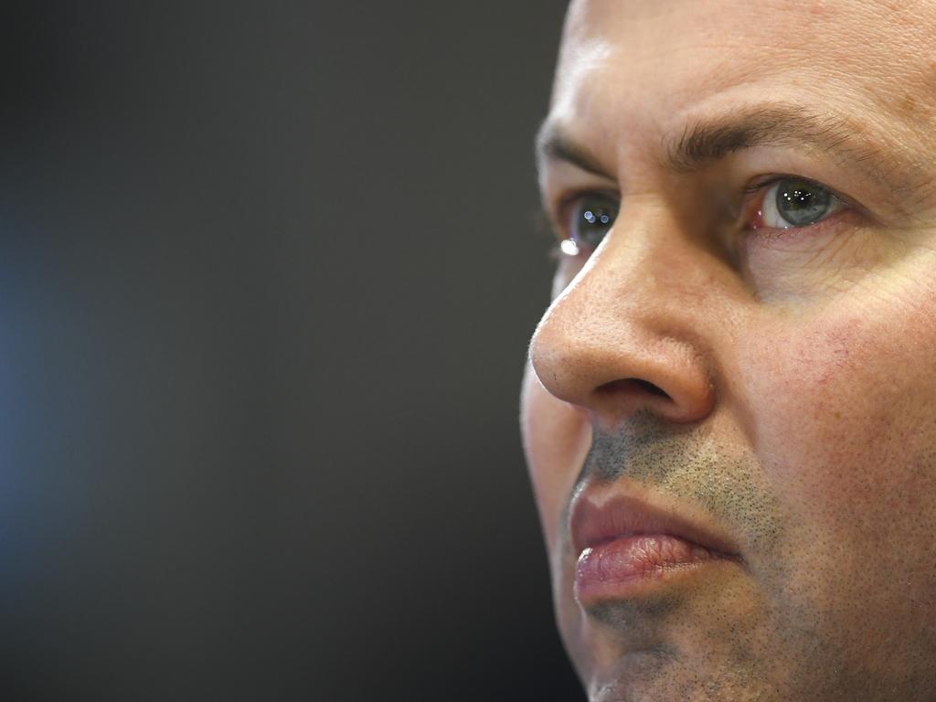 Australian Treasurer Josh Frydenberg listens to Australian Prime Minister Scott Morrison address the National Press Club in Canberra. Picture: AAP Image/Lukas Coch