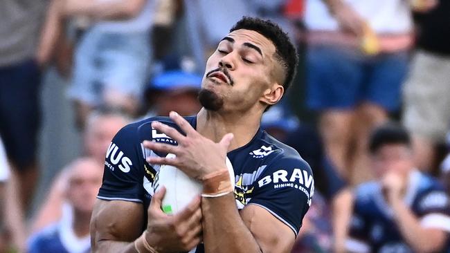 CAIRNS, AUSTRALIA - FEBRUARY 12: Robert Derby of the Cowboys makes a catch during the NRL Trial Match between North Queensland Cowboys and Dolphins at Barlow Park on February 12, 2023 in Cairns, Australia. (Photo by Emily Barker/Getty Images)