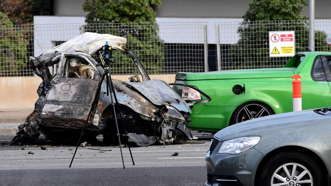 The remains of Nicole Tucker’s car near the Main South Rd exit of the Southern Expressway. Picture: Campbell Brodie.