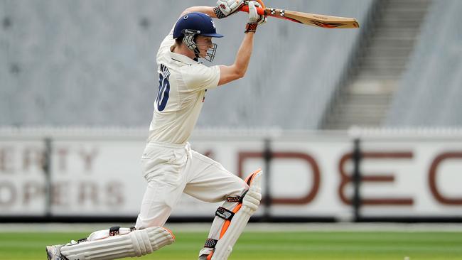 TOP SHOT: Alex Keath plays a classic off-drive for Victoria in a tour match against England at the MCG. 