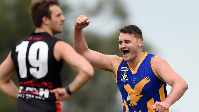 Nepean League Frankston v Somerville. Somerville's #62 Ben Crowe celebrates a goal as Frankston's #19 Ben Tournier looks on. Picture: Jason Sammon Saturday 16 April 2016