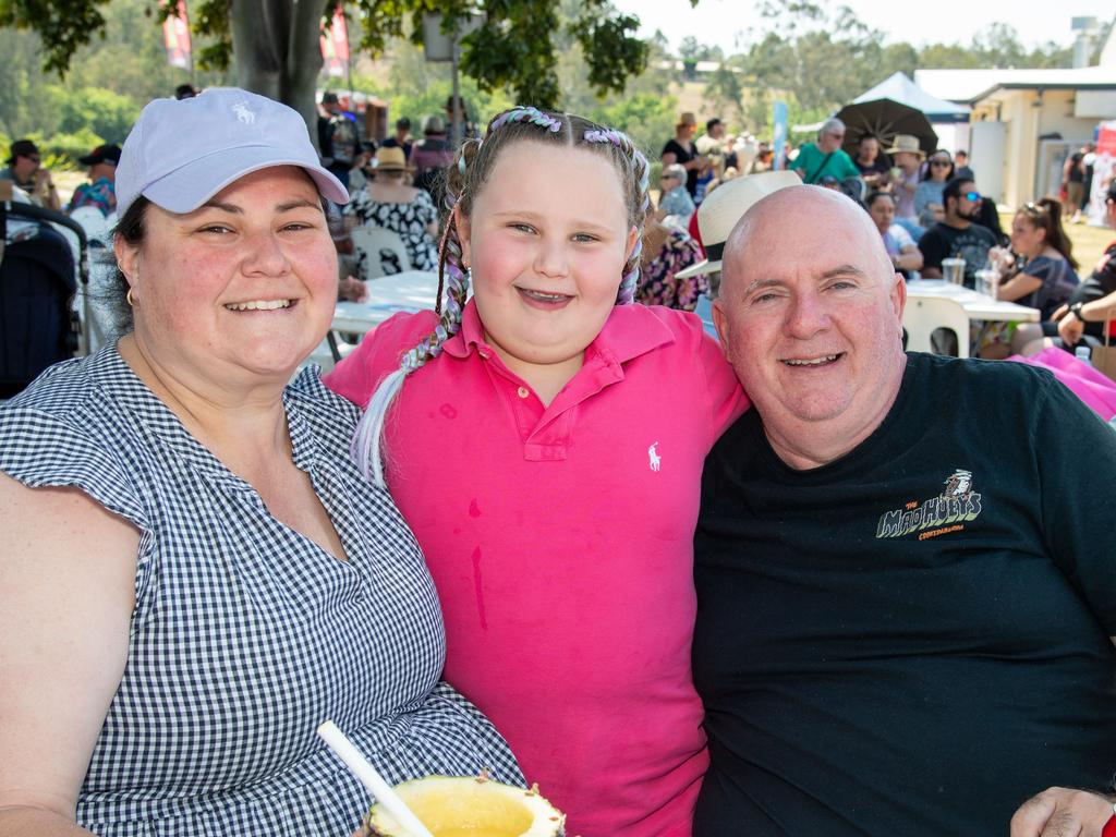 (From left) Stacy and Marnie Walton with Dave Proctor at the Murphys Creek Chilli and Craft carnival. Sunday, September 22, 2024. Picture: Nev Madsen