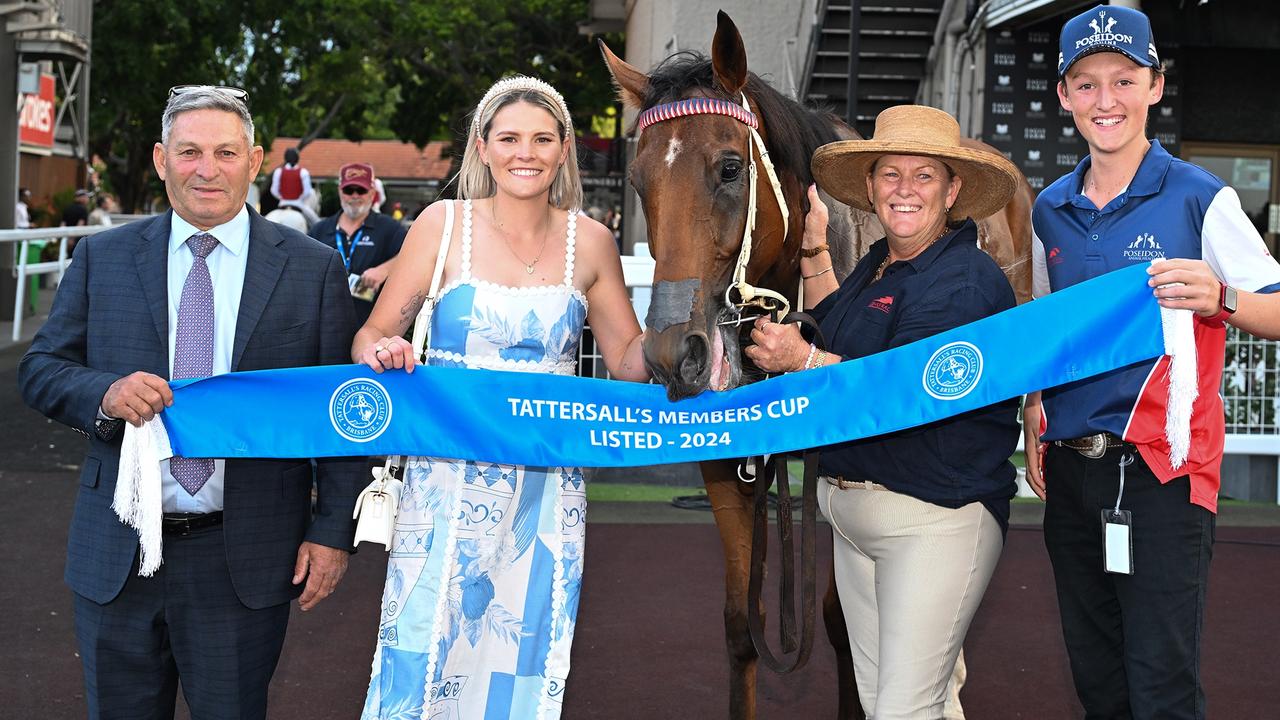 Trainers Tony and Maddy Sears (left and second from left) after the win of Yellow Brick at Eagle Farm. Picture: Grant Peters/Trackside Photography