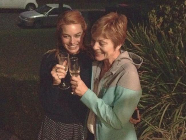 Margot Robbie and her mum toast to her 60th birthday. Picture: Instagram/ lockie_robbie