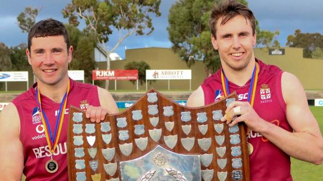 Craig Pitt (right) with Adam Perryman after the club’s 2021 grand final win over Payneham Norwood Union. Picture: Prince Alfred OC Football Club