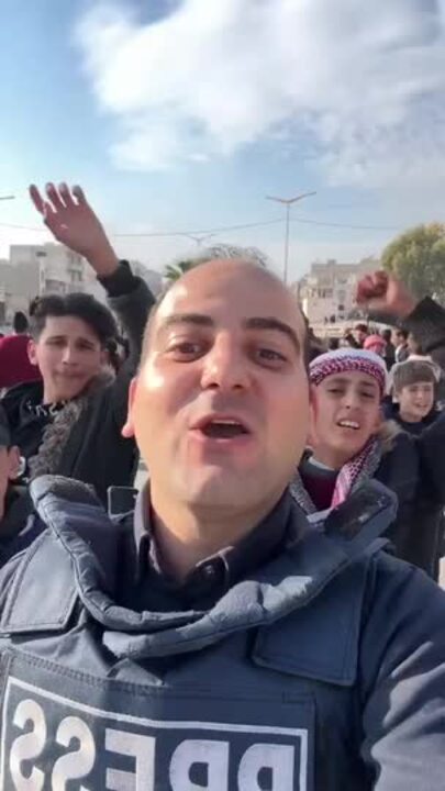 Boys Celebrate After Syrian Rebels Say They Captured Hama