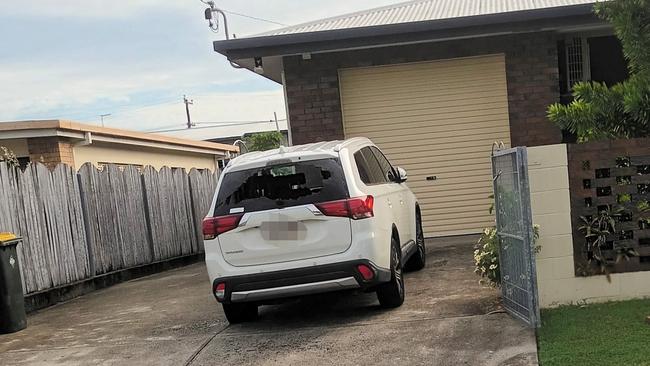 A smashed vehicle in the driveway of a Westcourt house. Picture: Supplied