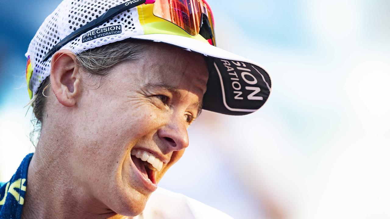 Cairns Iron Man - Womens Pro Winner Sarah Crowley ecstatic as he crosses the finish line e. Picture: Brian Cassey