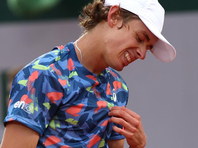 PARIS, FRANCE - MAY 24: Alex De Minaur of Australia reacts against Hugo Gaston of France during the Men's Singles First Round match on Day 3 of the French Open at Roland Garros on May 24, 2022 in Paris, France. (Photo by Adam Pretty/Getty Images)