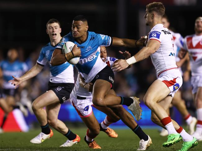 Ronaldo Mulitalo of the Sharks makes a break. Picture: Matt King/Getty Images