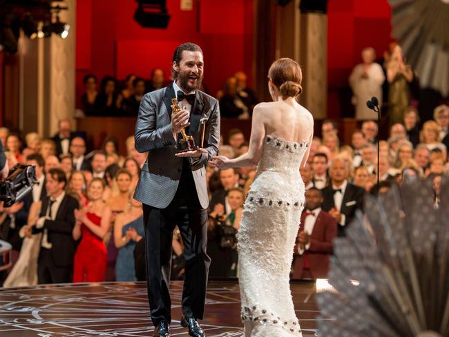 A different perspective on the Oscars, as Julianne Moore wins Best Actress and accepts the award from Matthew McConaughey in 2015.