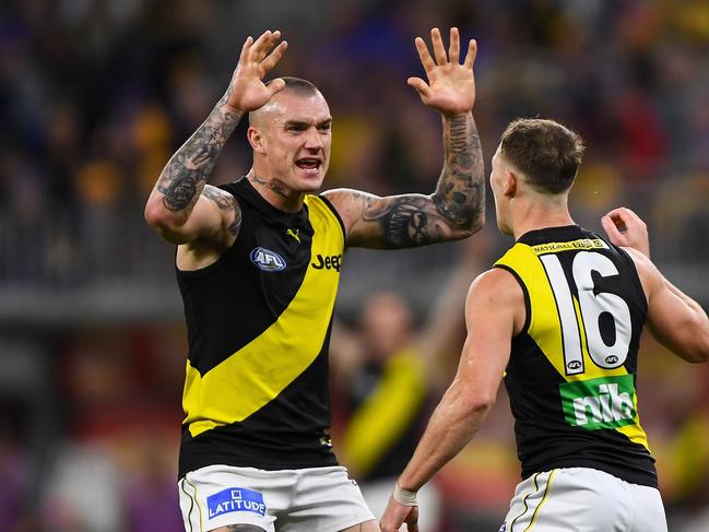 PERTH, AUSTRALIA - JUNE 13: Jake Aarts and Dustin Martin of the Tigers celebrates a goal during the 2021 AFL Round 13 match between the West Coast Eagles and the Richmond Tigers at Optus Stadium on June 13, 2021 in Perth, Australia. (Photo by Daniel Carson/AFL Photos via Getty Images)