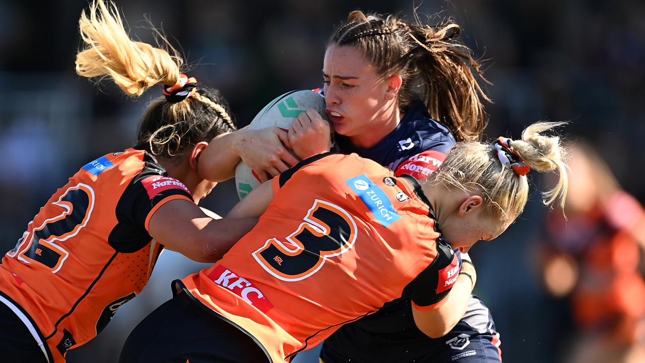 Francesca Goldthorp is tackled during the round four NRLW match between North Queensland Cowboys and Wests Tigers on August 12, 2023, in Brisbane, Australia. (Photo by Albert Perez/Getty Images)