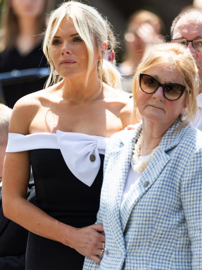 Molan, with her mother Anne at her father’s funeral last year. Pictures: Tim Hunter