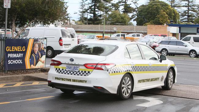 A security car outside Glenelg Primary School on Thursday, as police investigate the attempted child abduction at the school. Picture: Emma Brasier