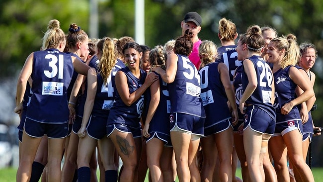 The Coolangatta Bluebirds huddle during a match. Pic: Jessy Hart