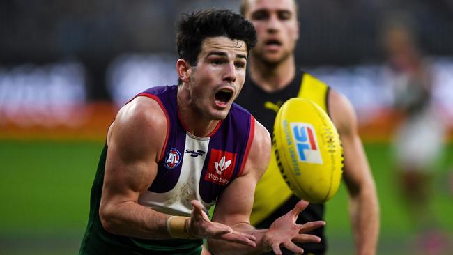 Andrew Brayshaw helped lead Fremantle to a win over Richmond that leaves the Dockers right in the finals race with three rounds to play. Picture: Getty Images