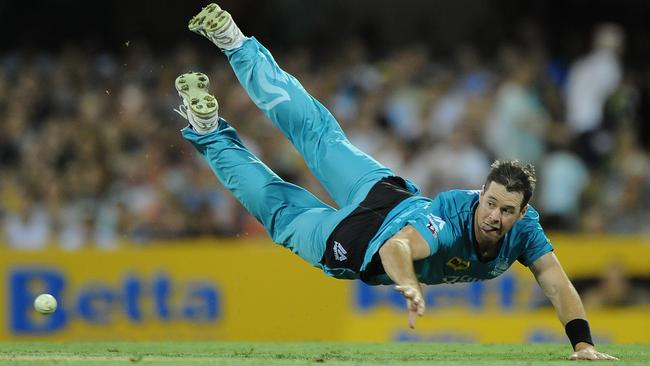 Dan Christian of the Heat fields during a BBL game at the Gabba.