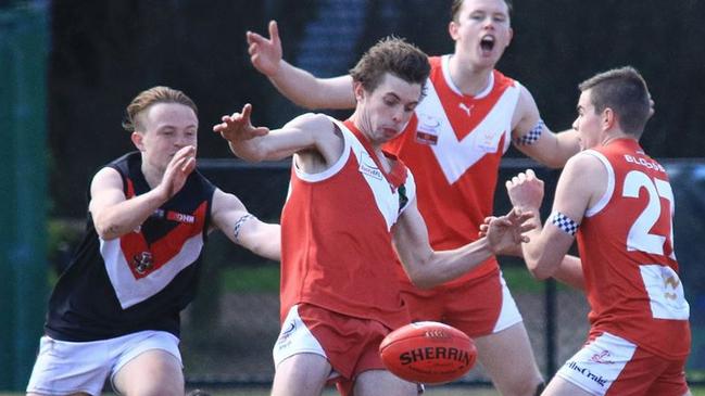 Warrandyte’s under-19s in action in last year’s grand final. Picture: Davis Harrigan