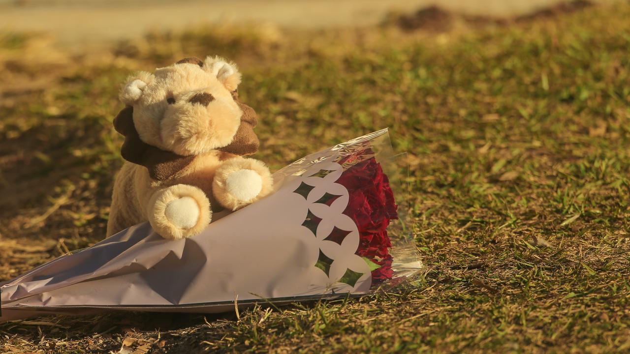 Tributes have been left after toddler died after reportedly being run over by a car out the front of a home north of Brisbane. Picture: NCA Newswire/Glenn Campbell