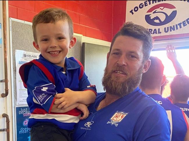 Nathan Fenwick with son Noah at Central United Football Club. He will celebrate a club record 350 games on Saturday, also the club’s 60th anniversary. Picture: Central United Football Club