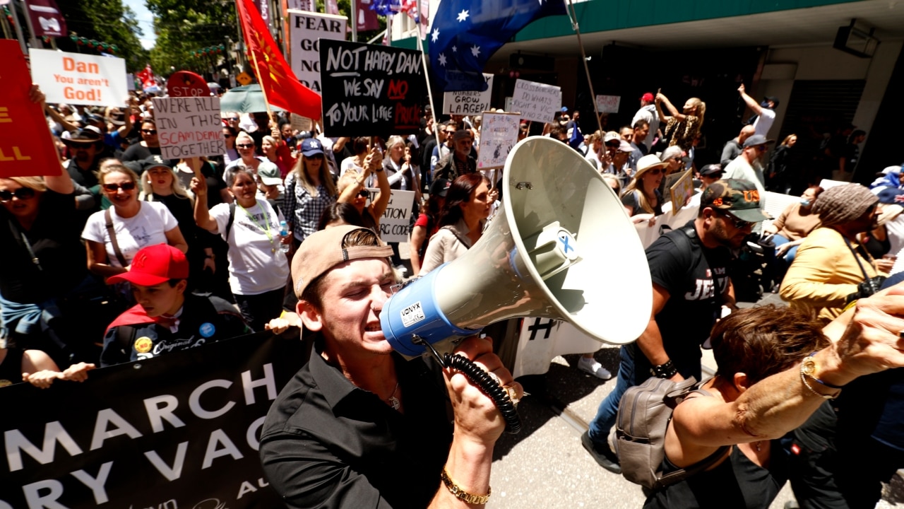 At least 20,000 protesters storm Melbourne CBD over mandatory vaccines ...