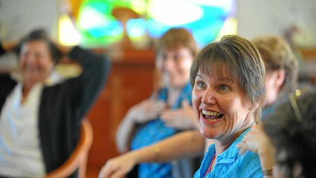 SMILES ALL ROUND: Ros Houlahan conducts a Laugh Yoga class at Dougherty Villa. Picture: JoJo Newby