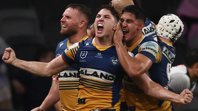 Mitchell Moses celebrates Maika Sivo’s try after setting it up with a bomb kick.