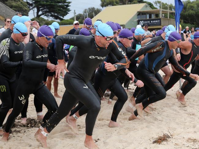 Wreck2Reef swims at Indented Head beach. 40-49 and 50-59 year old male race gets under way. Picture: Mike Dugdale