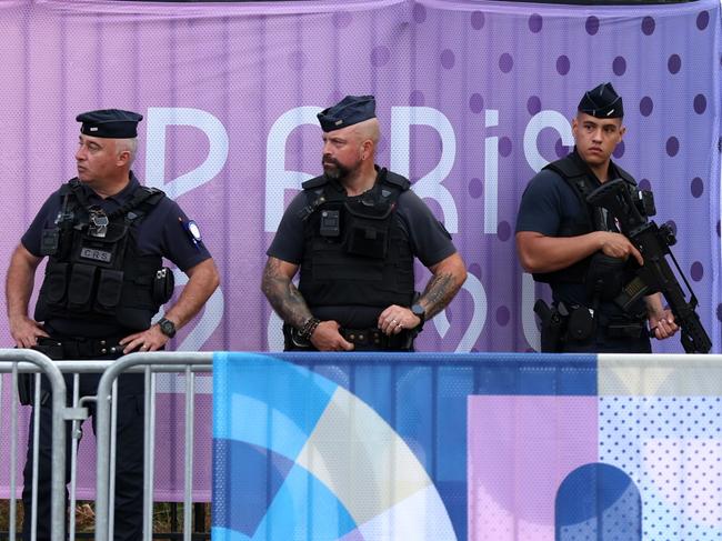 PARIS, FRANCE - JULY 24: Armed Police are seen on the streets outside the stadium prior to the Men's group D match between Mali and Israel during the Olympic Games Paris 2024 at Parc des Princes on July 24, 2024 in Paris, France. (Photo by Maja Hitij/Getty Images)