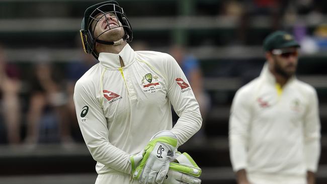 Australian captain Tim Paine grimaces after being hit on his right thumb. Picture: AP