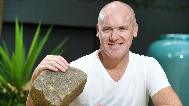 Stuart O'Grady at home with his Paris-Roubaix rock trophy. Picture: Roger Wyman.