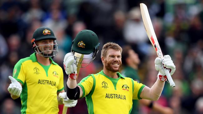 David Warner celebrates reaching his century against Pakistan at The County Ground in Taunton, England