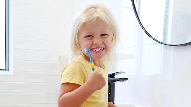 3 yr old Airlie Baker brushes her teeth at her home in Port Macquarie. There is debate on whether Port Macquarie Council should be adding Fluoride to the town water supply.  Pic Nathan Edwards