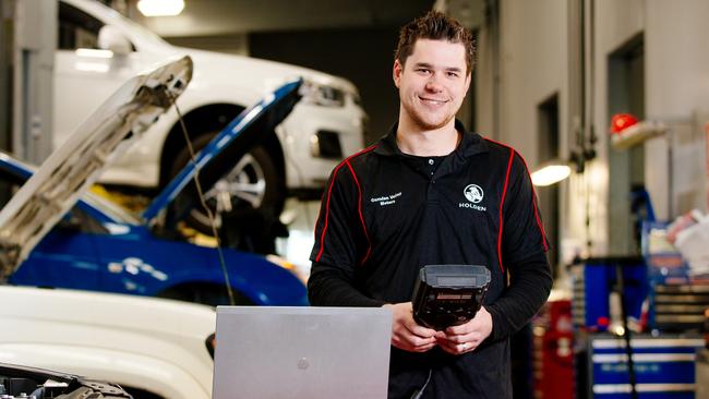 Camden Valley Holden workshop foreman Josh Ellacott says being a mechanic is more technical, even than when he started his apprenticeship eight years ago. Picture: Jonathan Ng