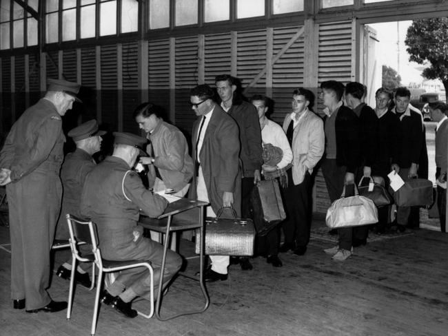 National Service trainees arrive with their bags at Marrickville Army Depot in Sydney in June 1965.