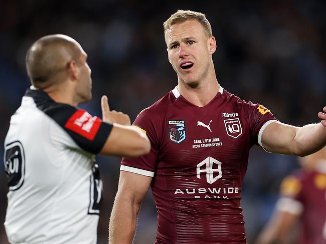 Maroons captain Daly Cherry-Evans speaking to Ashley Klein. Picture: Mark Kolbe/Getty Images