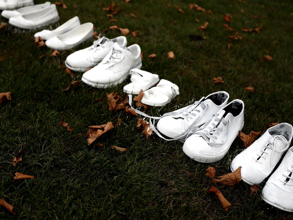 Fifty pairs of white shoes have been laid in front of All Souls Anglican Church in honour of victims who lost their lives in Christchurch. Picture: Getty Images