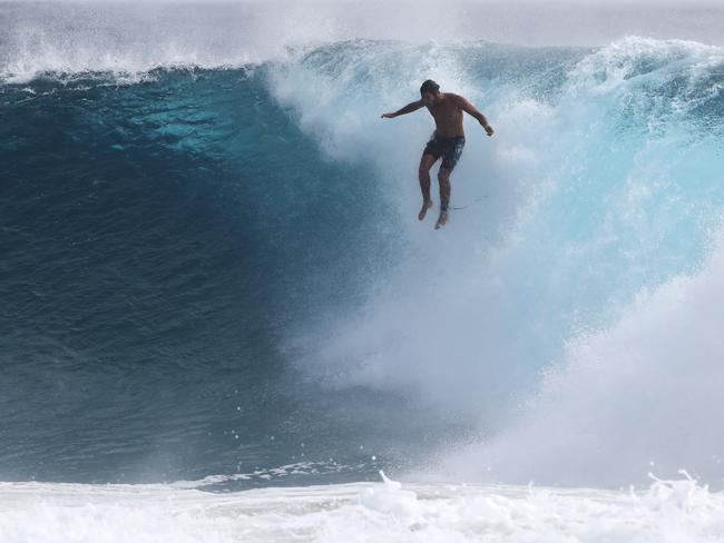 Surfers at Snapper Rocks and Kirra riding the Large swell produced by   Cyclone OMA.Photograph : Jason O'Brien