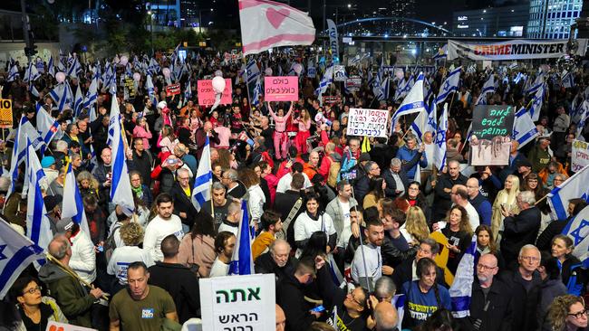 Israelis call for the release of Israeli hostages in front of the Israeli Defence Ministry in Tel Aviv. Picture: AFP.