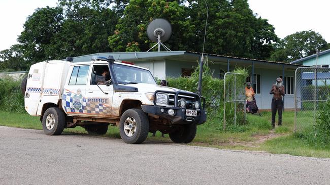 Police officers stop outside the house of Jimmy Pootchamunka and Bettina Pootchamunka in Aurukun, a small Indigenous town on the Gulf of Carpentaria, 800 kilometres north northwest of Cairns on Cape York in Far North Queensland. Picture: Brendan Radke