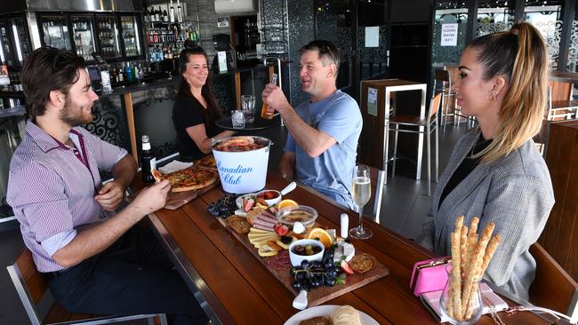 Alan Haber, Manager Tania Mackie, David Egan and Megan Gray before the official opening of the MOJO Rooftop Bar at the Ambassador Hotel. Picture: Tony Martin