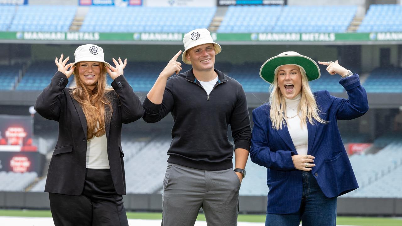 Summer, Jackson and Brooke Warne with number 23 hats. Picture: Jason Edwards