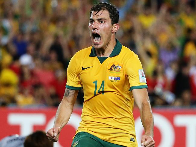 James Troisi celebrates scoring the goal that won Australia the 2015 Asian Cup. Picture: Brett Costello