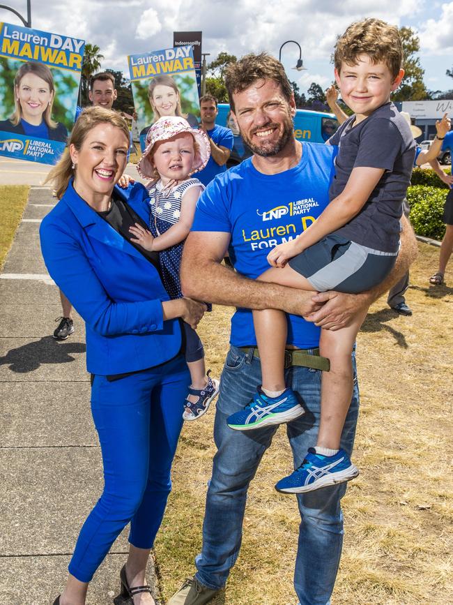 Lauren Day, with husband Matthew and children Joseph, 6, and Rosie, 1, and volunteers at Indooroopilly. She has described the graffiti attacks as “disrespectful” and “disappointing”. Picture: Richard Walker.